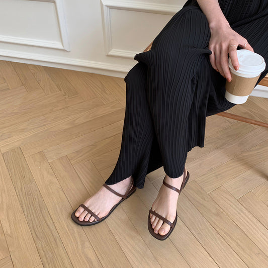 Sandalias planas de piel autentica