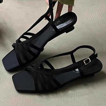 Sandalias de cuña con tiras tejidas